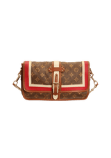 LIMITED EDITION MONOGRAM TISSE PORTE RAYURES CLUTCH