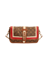 LIMITED EDITION MONOGRAM TISSE PORTE RAYURES CLUTCH