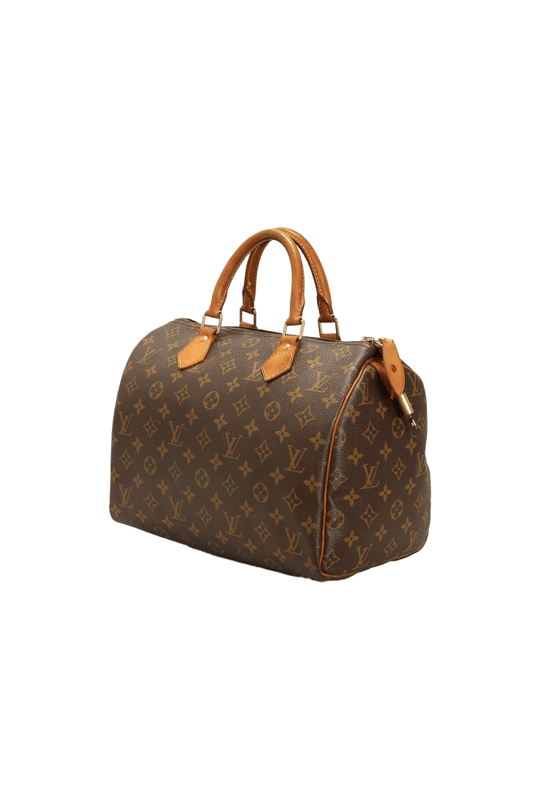 LOUIS VUITTON - Uma bolsa de viagem e uma bolsa de mão em bom