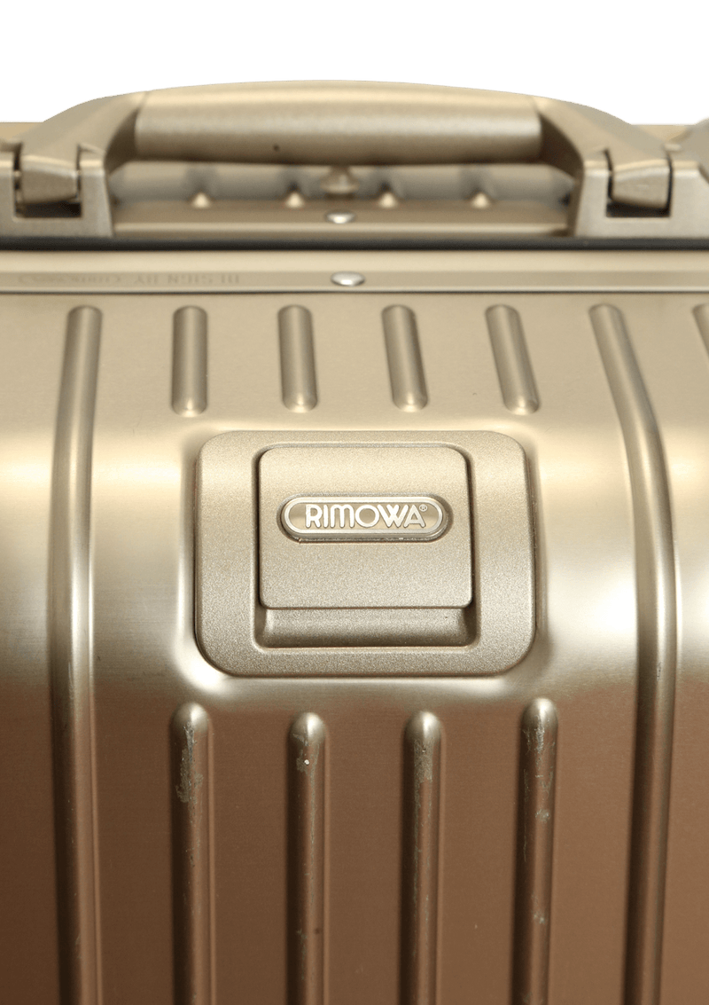 BOLSA RIMOWA TOPAS ELECTRONIC TAG SUITCASE DOURADO ORIGINAL Gringa