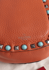 MINI ROCKSTUD ROLLING BUCKET BAG