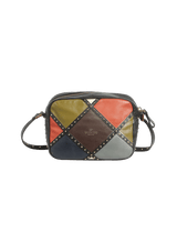 STUDDED COLORBLOCK PATCHWORK CAMERA BAG