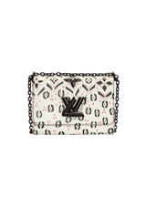 LIMITED EDITION TWIST GRAPHIC PRINT WALLET MM