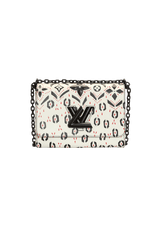 LIMITED EDITION TWIST GRAPHIC PRINT WALLET MM