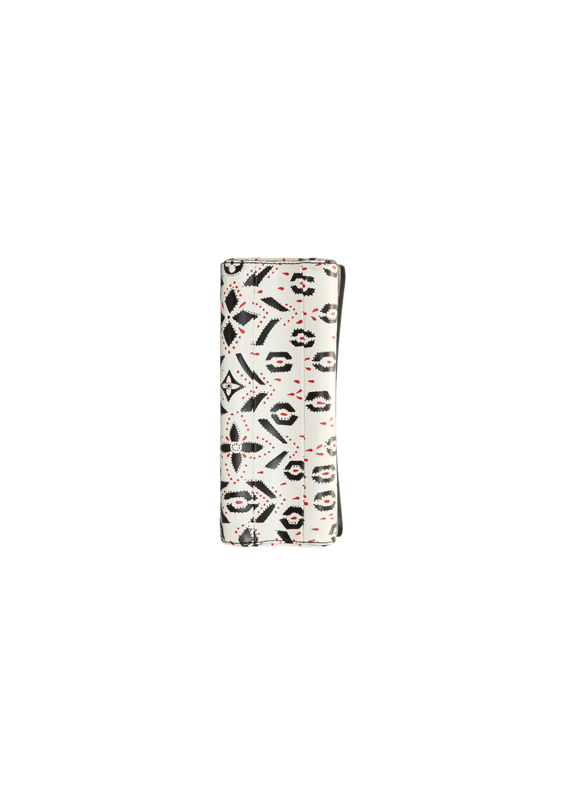 LIMITED EDITION TWIST GRAPHIC PRINT WALLET MM