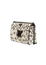 LIMITED EDITION TWIST GRAPHIC PRINT WALLET MM