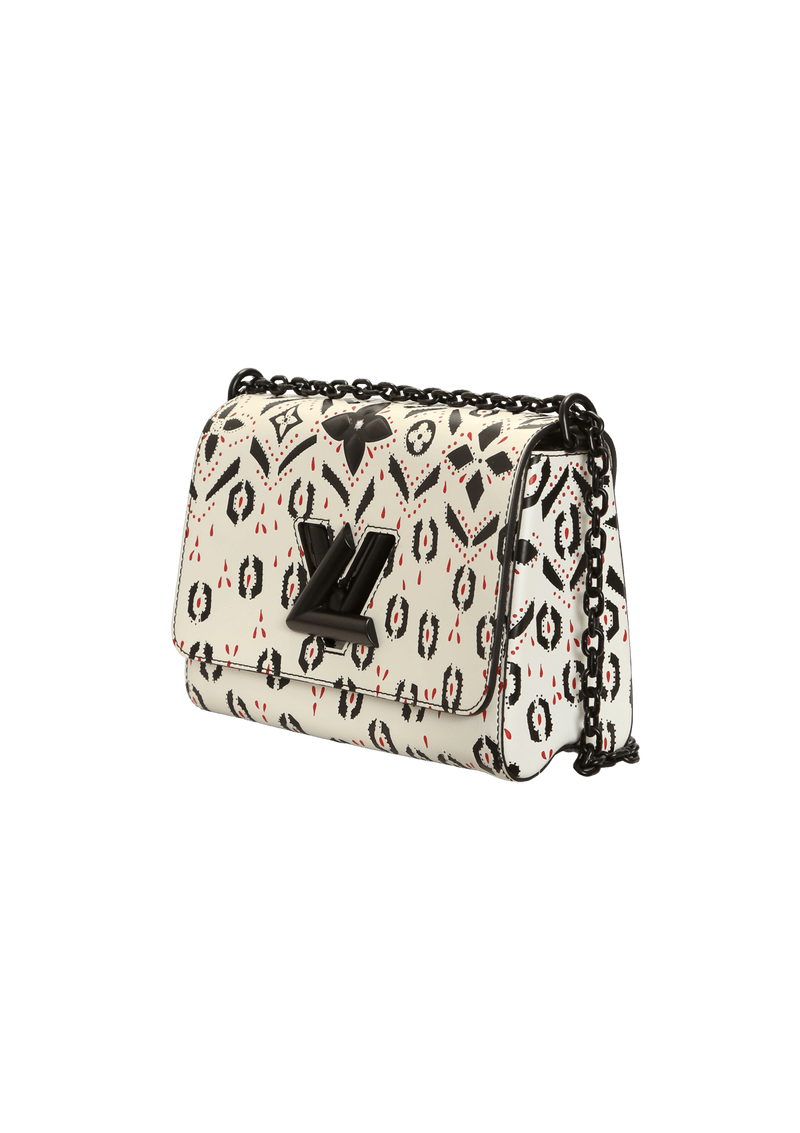 LIMITED EDITION TWIST GRAPHIC PRINT WALLET MM