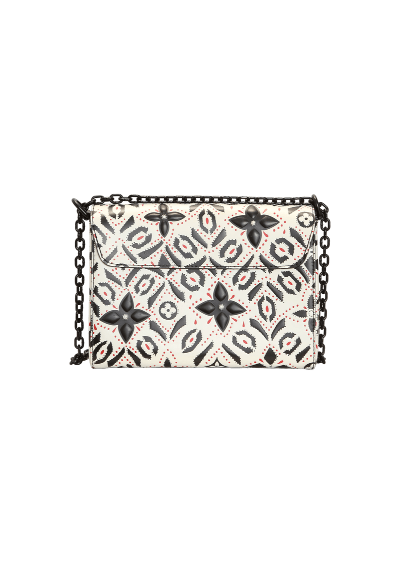 LIMITED EDITION TWIST GRAPHIC PRINT WALLET MM