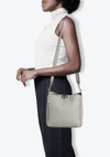 ROCKSTUD FLIP-LOCK MESSENGER BAG