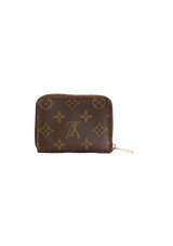 MONOGRAM ZIPPY WALLET