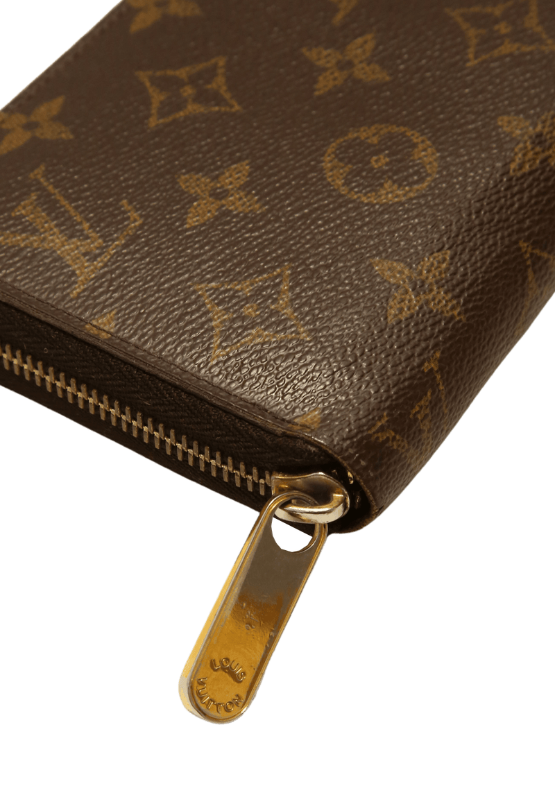 MONOGRAM ZIPPY WALLET