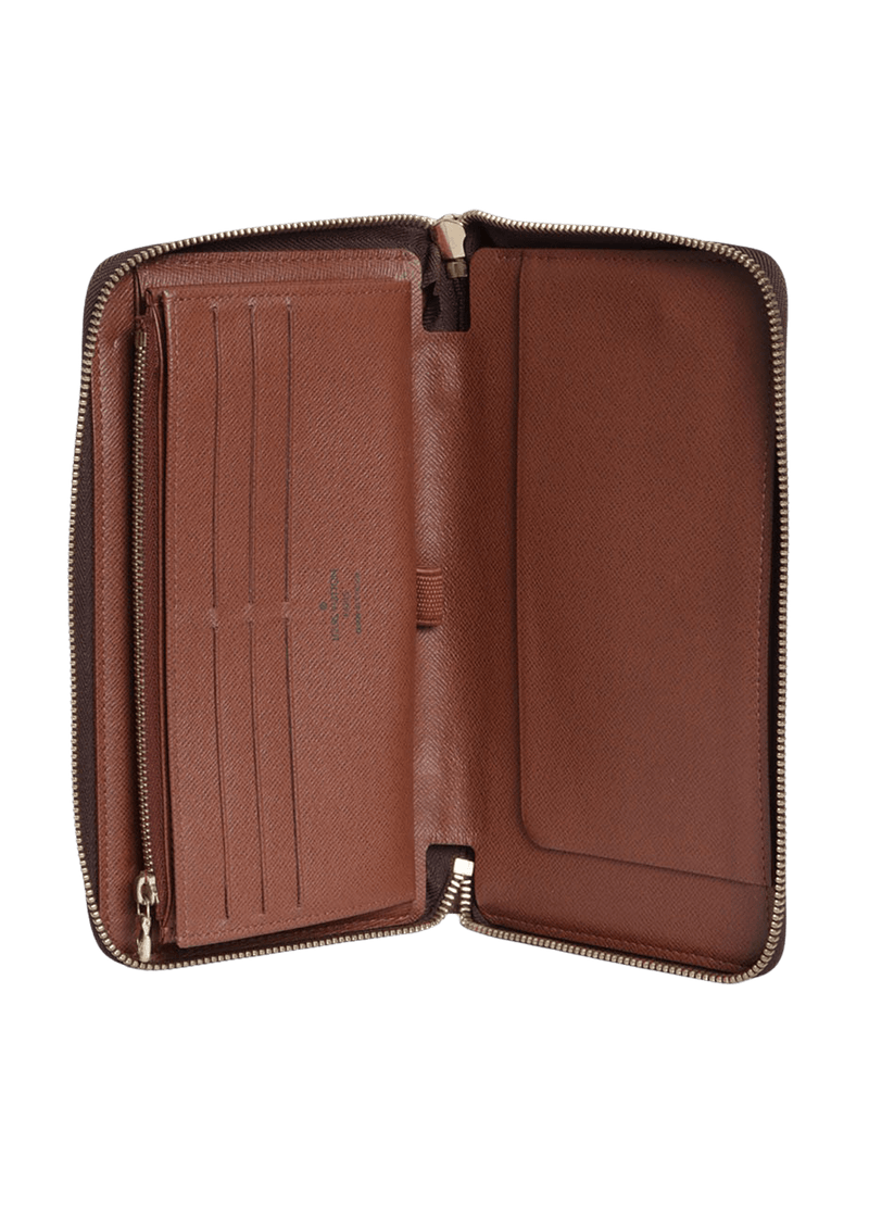 MONOGRAM ZIPPY WALLET