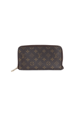 MONOGRAM ZIPPY WALLET