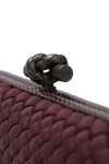 CLUTCH ELONGATED KNOT