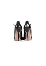 PATENT LEATHER PUMPS  33