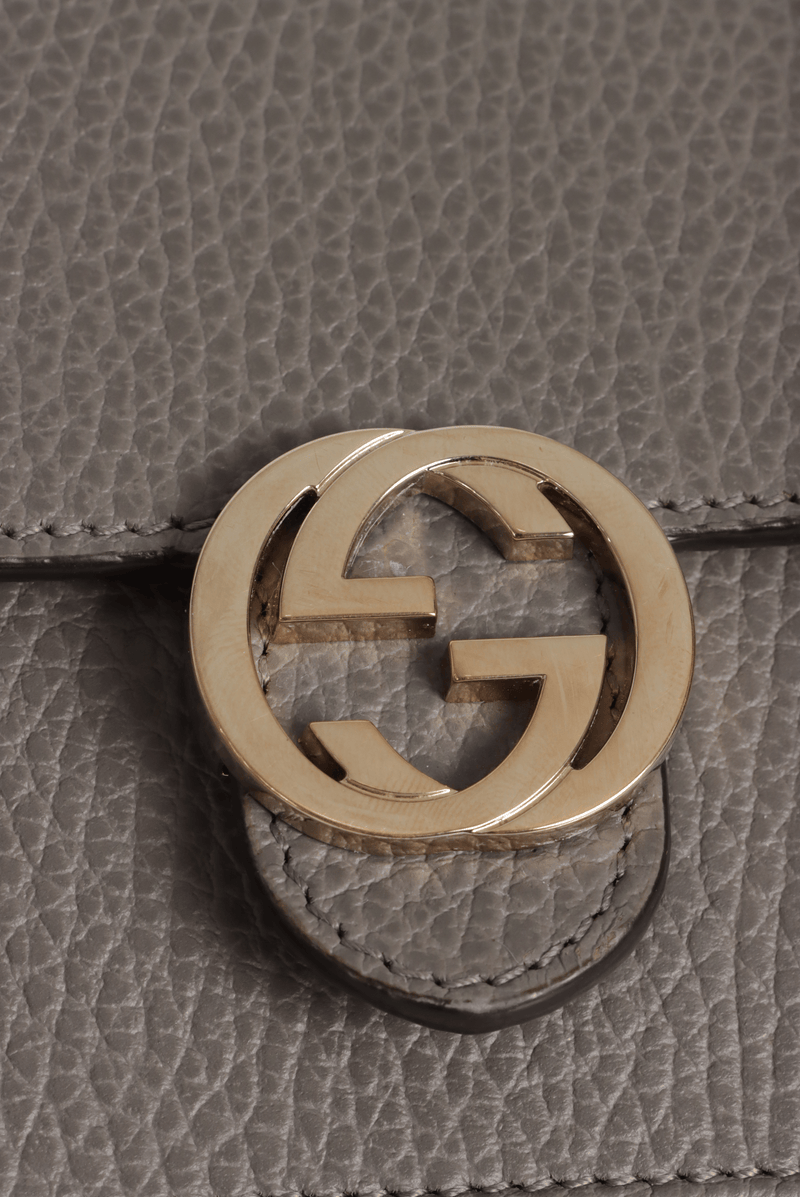 INTERLOCKING G DOLLAR WALLET ON CHAIN