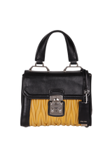 MATELASSÉ TOP HANDLE BAG