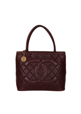 MEDALLION QUILTED CAVIAR TOTE