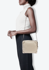 GG EMBOSSED PERFORATED SQUARE BAG