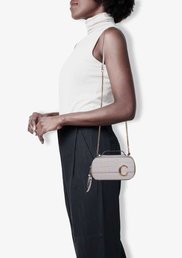CROCODILE EMBOSSED MINI C VANITY BAG