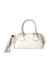 LAX TASSEL BOWLER BAG
