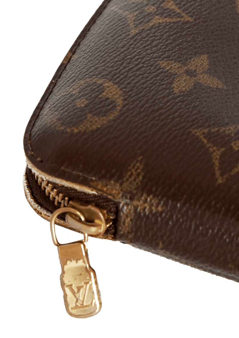 VINTAGE MONOGRAM VERTICAL ZIPPY WALLET