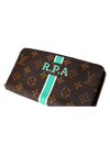 MONOGRAM ZIPPY WALLET