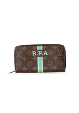 MONOGRAM ZIPPY WALLET