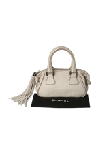 LAX TASSEL BOWLER BAG