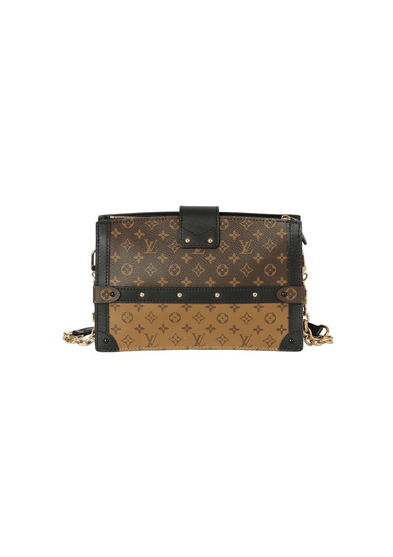 Reverse Monogram Trunk Clutch