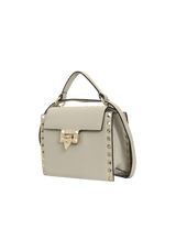 ROCKSTUD OVERLAY FLAP TOP HANDLE BAG