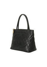 MEDALLION QUILTED CAVIAR TOTE