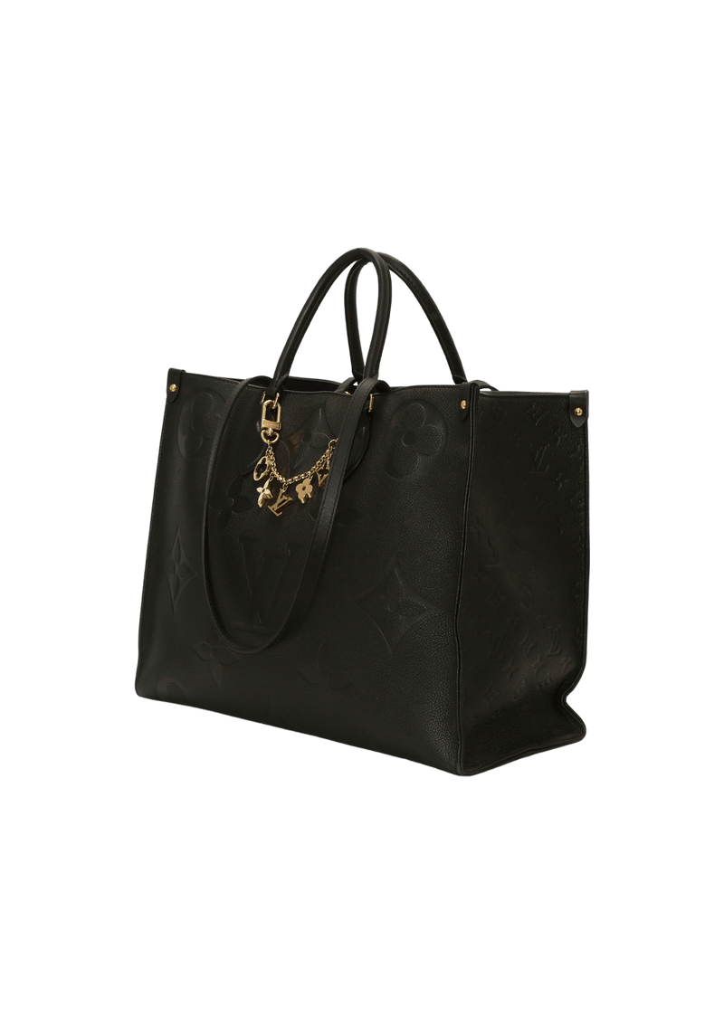 MONOGRAM EMPREINTE ONTHEGO GM + CHARM FLEUR DE MONOGRAM