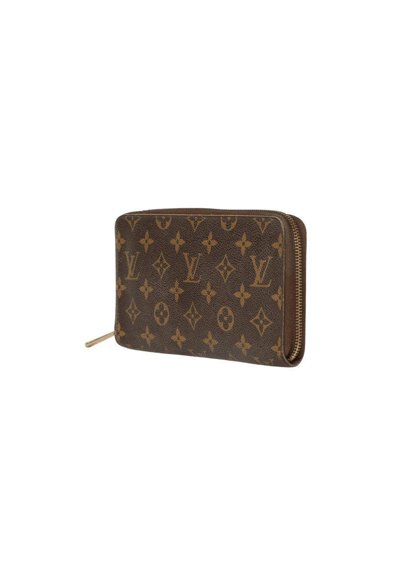 MONOGRAM ZIPPY WALLET