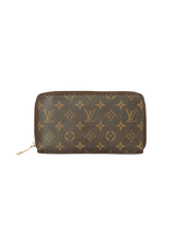 MONOGRAM ZIPPY WALLET