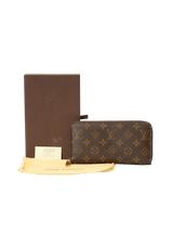 MONOGRAM ZIPPY WALLET